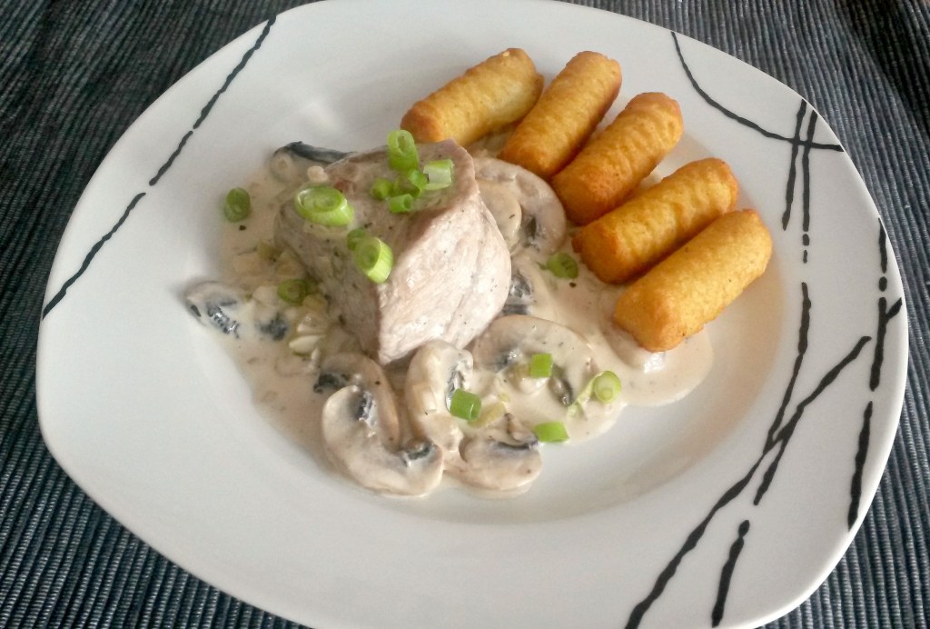 Schweinemedaillons an Rieslingrahm bearbeitet